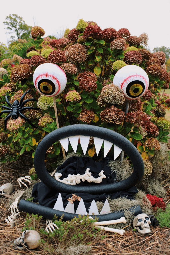 20 Hauntingly Creative Shrub Decorations for a Show-Stopping Halloween Yard 17