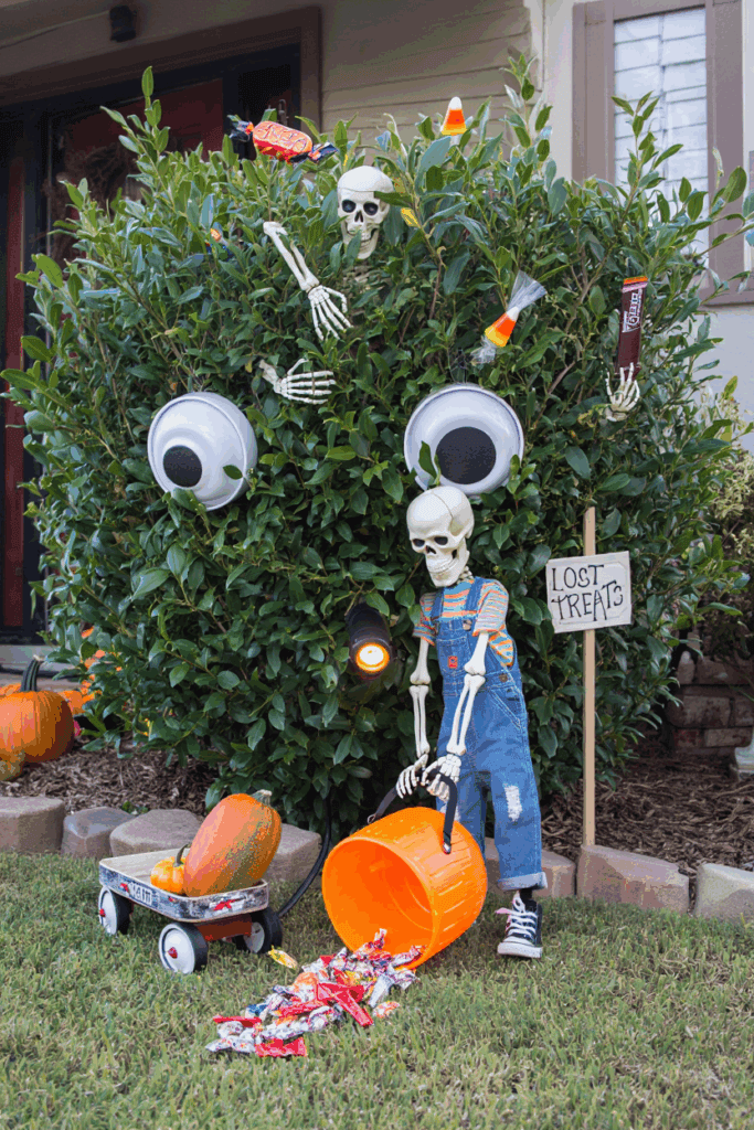 20 Hauntingly Creative Shrub Decorations for a Show-Stopping Halloween Yard 7