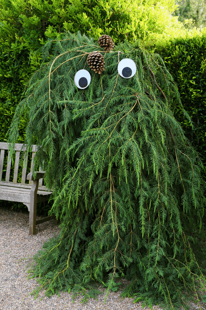 20 Hauntingly Creative Shrub Decorations for a Show-Stopping Halloween Yard 20