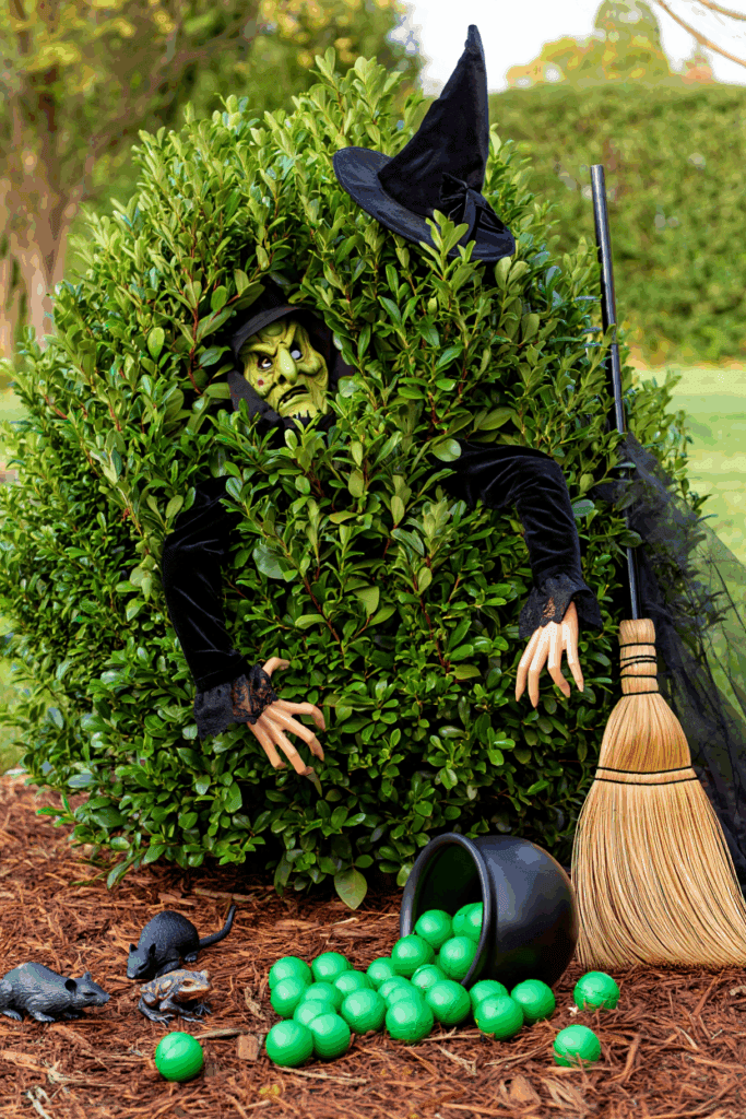 20 Hauntingly Creative Shrub Decorations for a Show-Stopping Halloween Yard 10